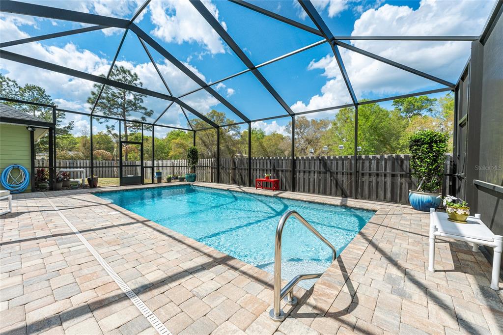 8420 Southwest 92nd Lane Gainesville, FL 32608 - Photo 31 of 46 a view of a swimming pool with a patio