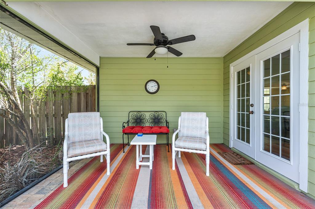 8420 Southwest 92nd Lane Gainesville, FL 32608 - Photo 35 of 46 a house view with a sitting space and large trees