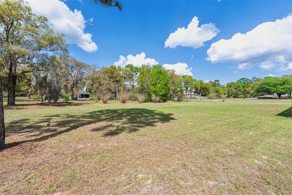 8420 Southwest 92nd Lane Gainesville, FL 32608 - Photo 39 of 46 a view of a golf course with a lake