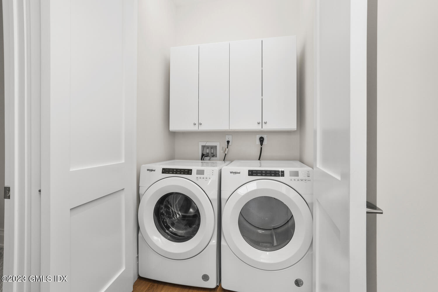 88 South Water Street, Unit 106 Greenwich, CT 06830 - Photo 13 of 24 a utility room with dryer and washer