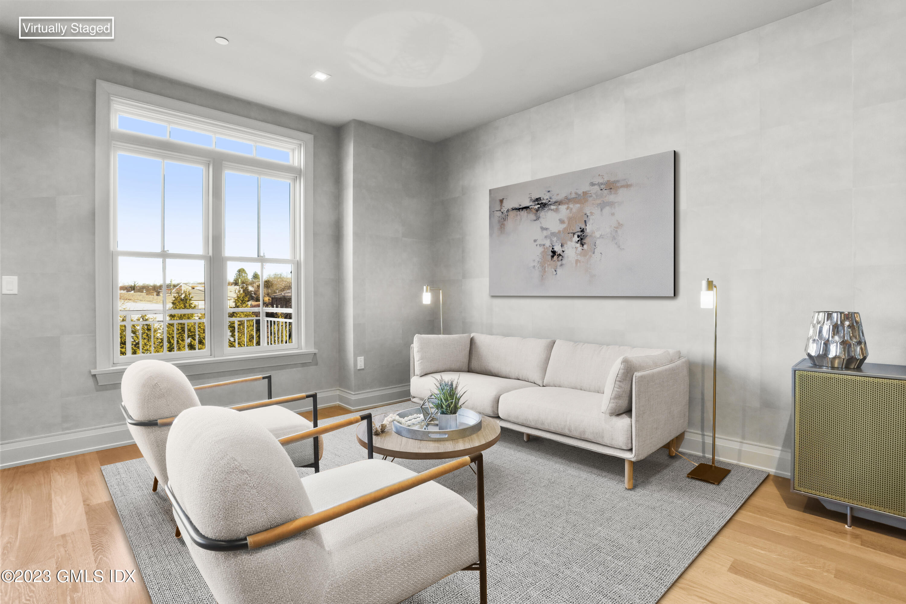 88 South Water Street, Unit 106 Greenwich, CT 06830 - Photo 16 of 24 a living room with furniture and a large window