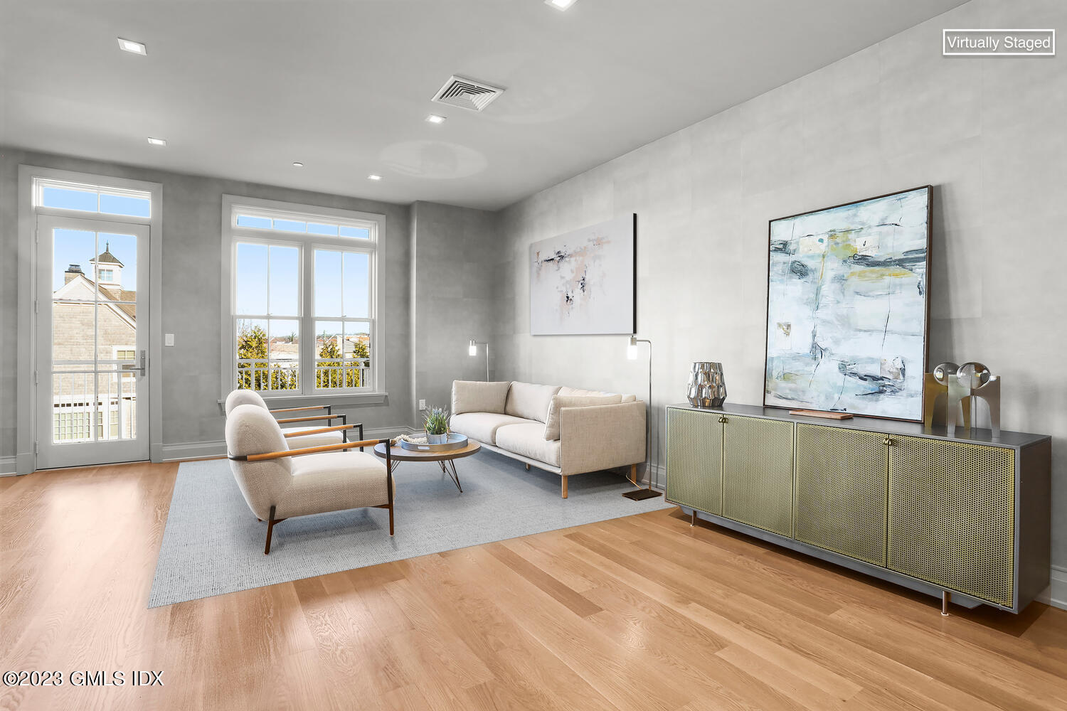 88 South Water Street, Unit 106 Greenwich, CT 06830 - Photo 17 of 24 a living room with furniture and a large window