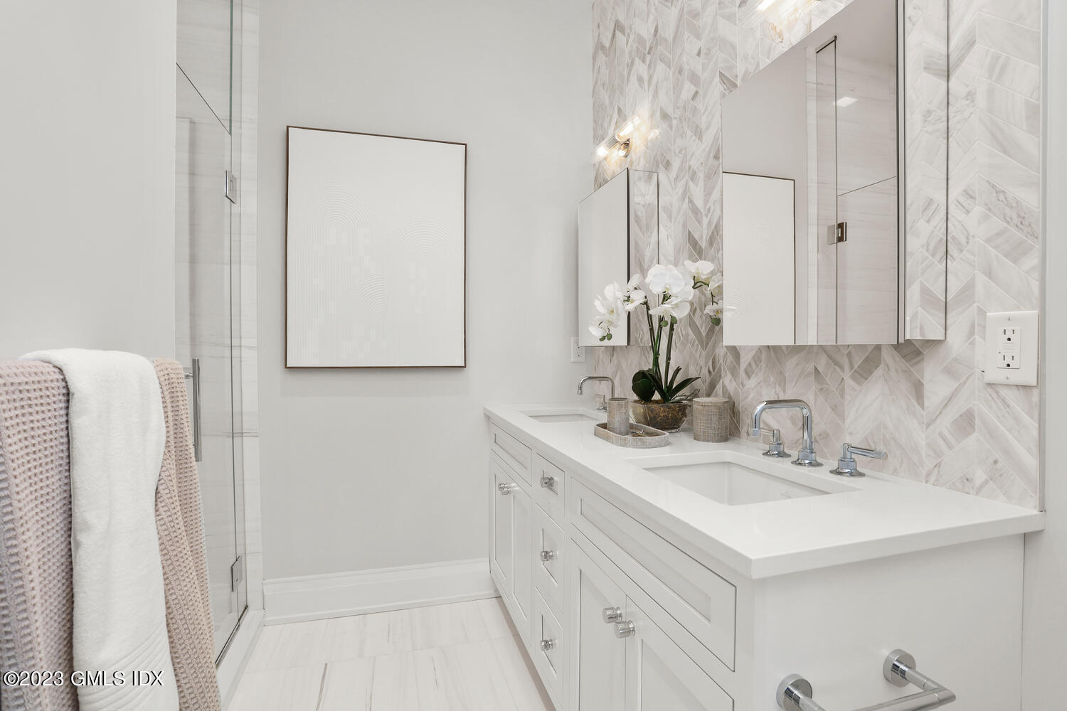 88 South Water Street, Unit 106 Greenwich, CT 06830 - Photo 10 of 24 a bathroom with a sink vanity and a mirror