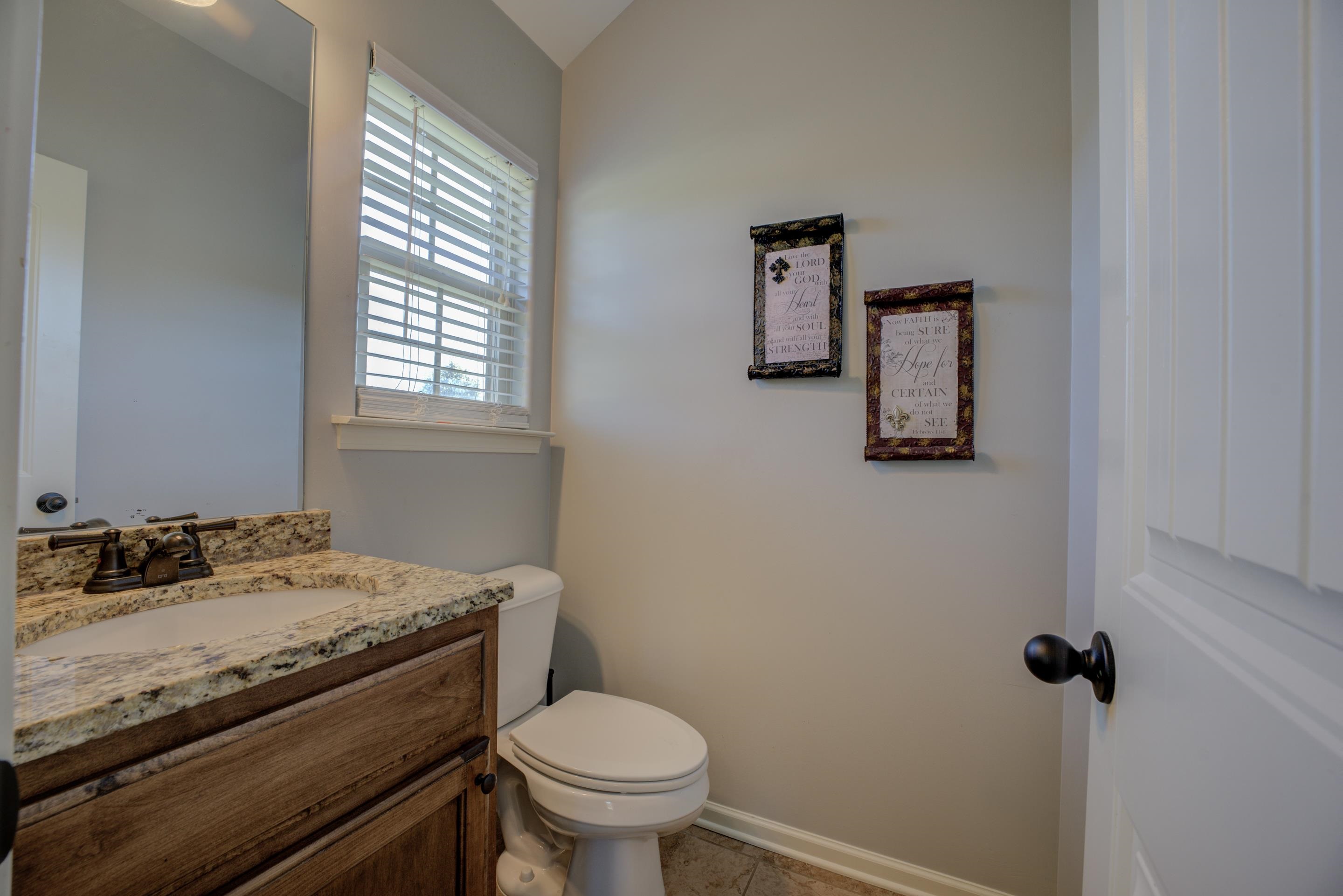 370 Pearl Road Somerville, TN 38068 - Photo 29 of 39 Upstairs Half Bathroom, tile patterned floors, vanity, and toilet,