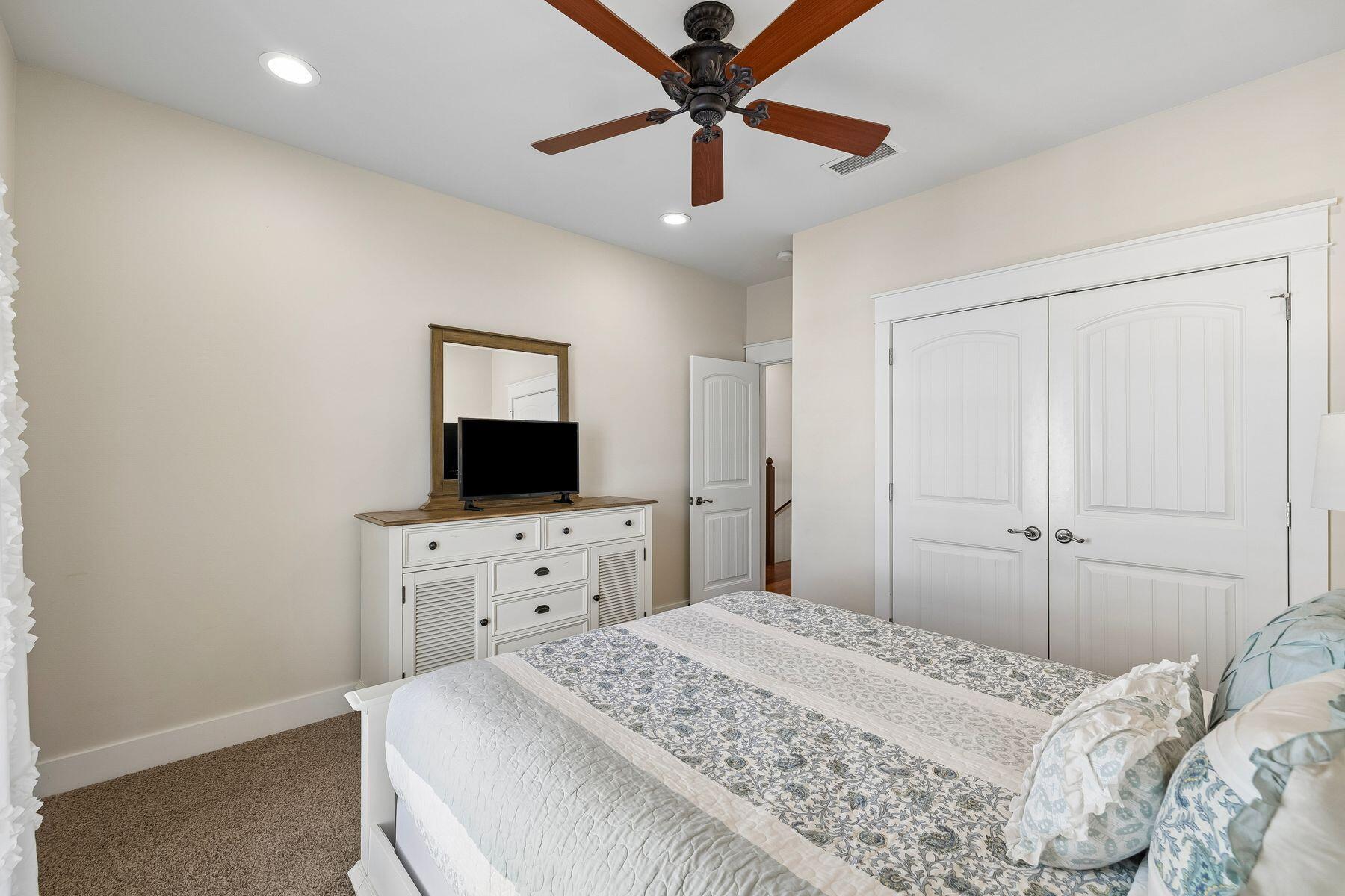 39 Willow Mist Road Inlet Beach, FL 32461 - Photo 20 of 41 a bedroom with a bed and a flat screen tv