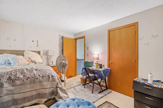 a view of a room with furniture