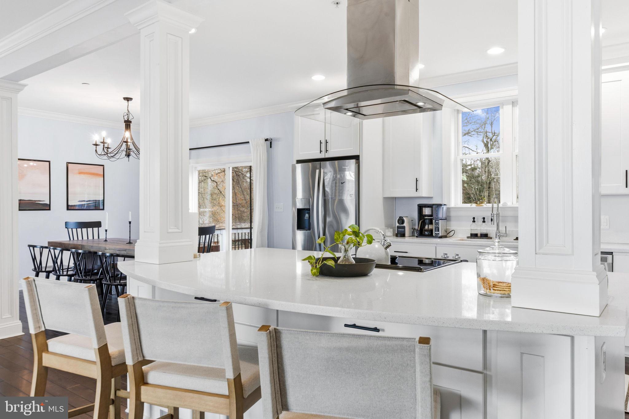 3628 Bay Drive Baltimore, MD 21220 - Photo 18 of 72 a view of a kitchen counter space a sink and living room view