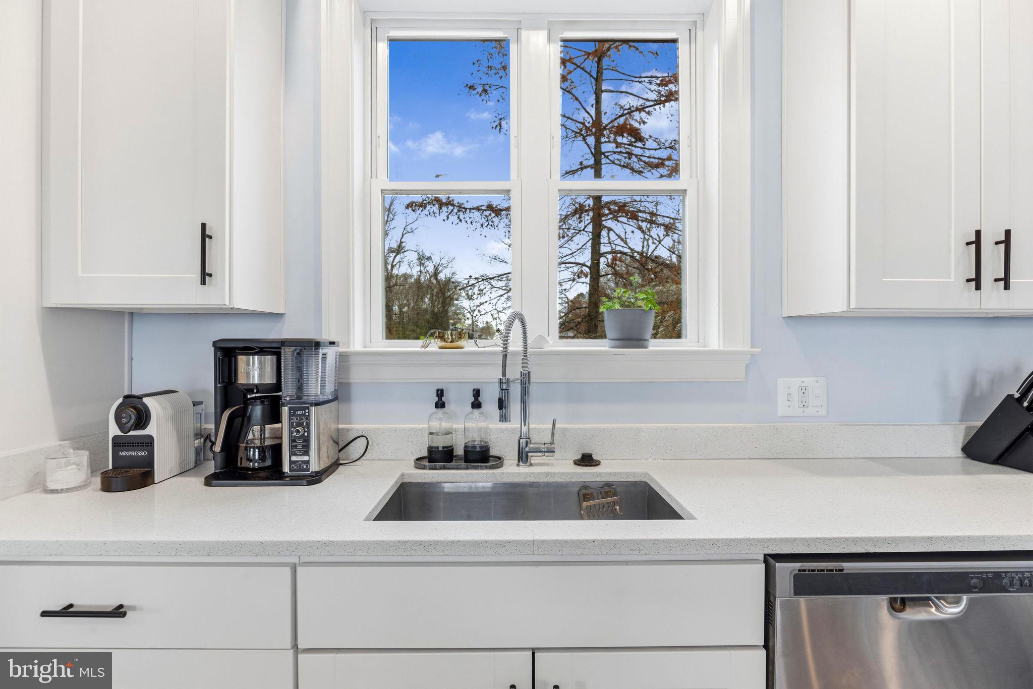 3628 Bay Drive Baltimore, MD 21220 - Photo 23 of 72 a kitchen with a sink and a window