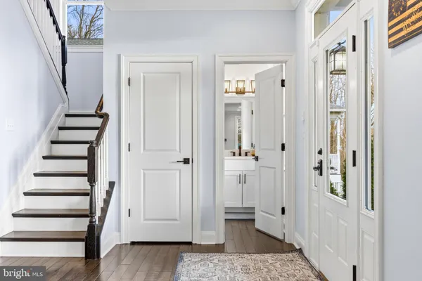a bedroom with a bed and cabinets