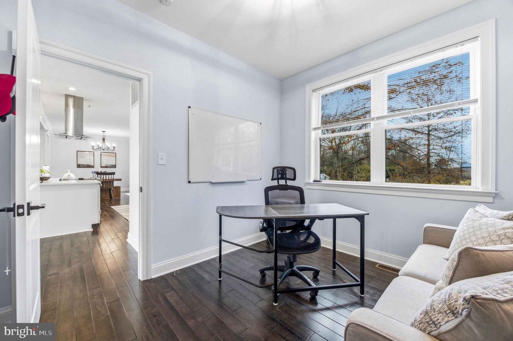 3628 Bay Drive Baltimore, MD 21220 - Photo 29 of 72 a living room with furniture and a window