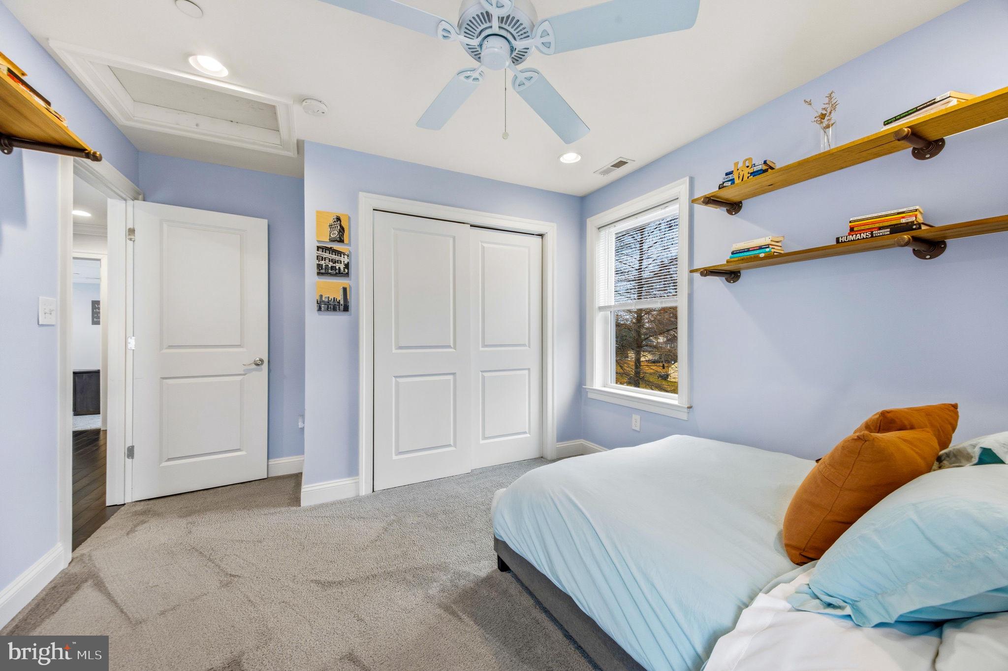 3628 Bay Drive Baltimore, MD 21220 - Photo 33 of 72 a bedroom with a bed and cabinets