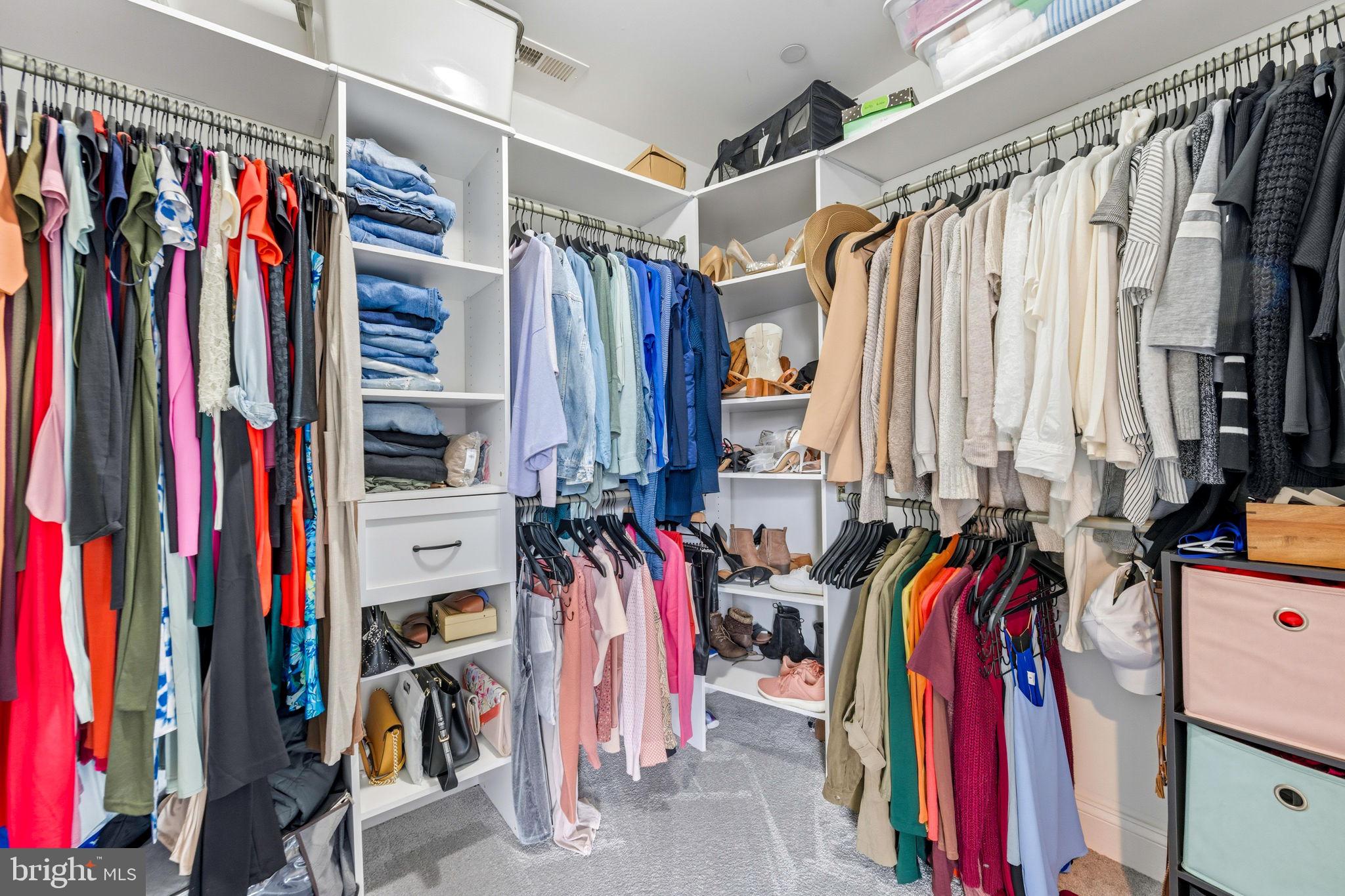 3628 Bay Drive Baltimore, MD 21220 - Photo 41 of 72 a view of walk in closet with clothes