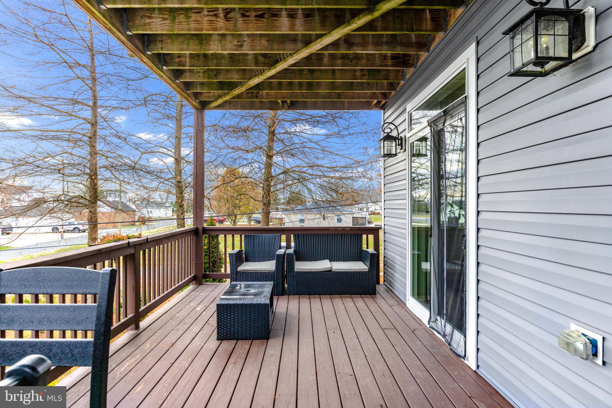 3628 Bay Drive Baltimore, MD 21220 - Photo 55 of 72 a view of balcony with couch and wooden floor
