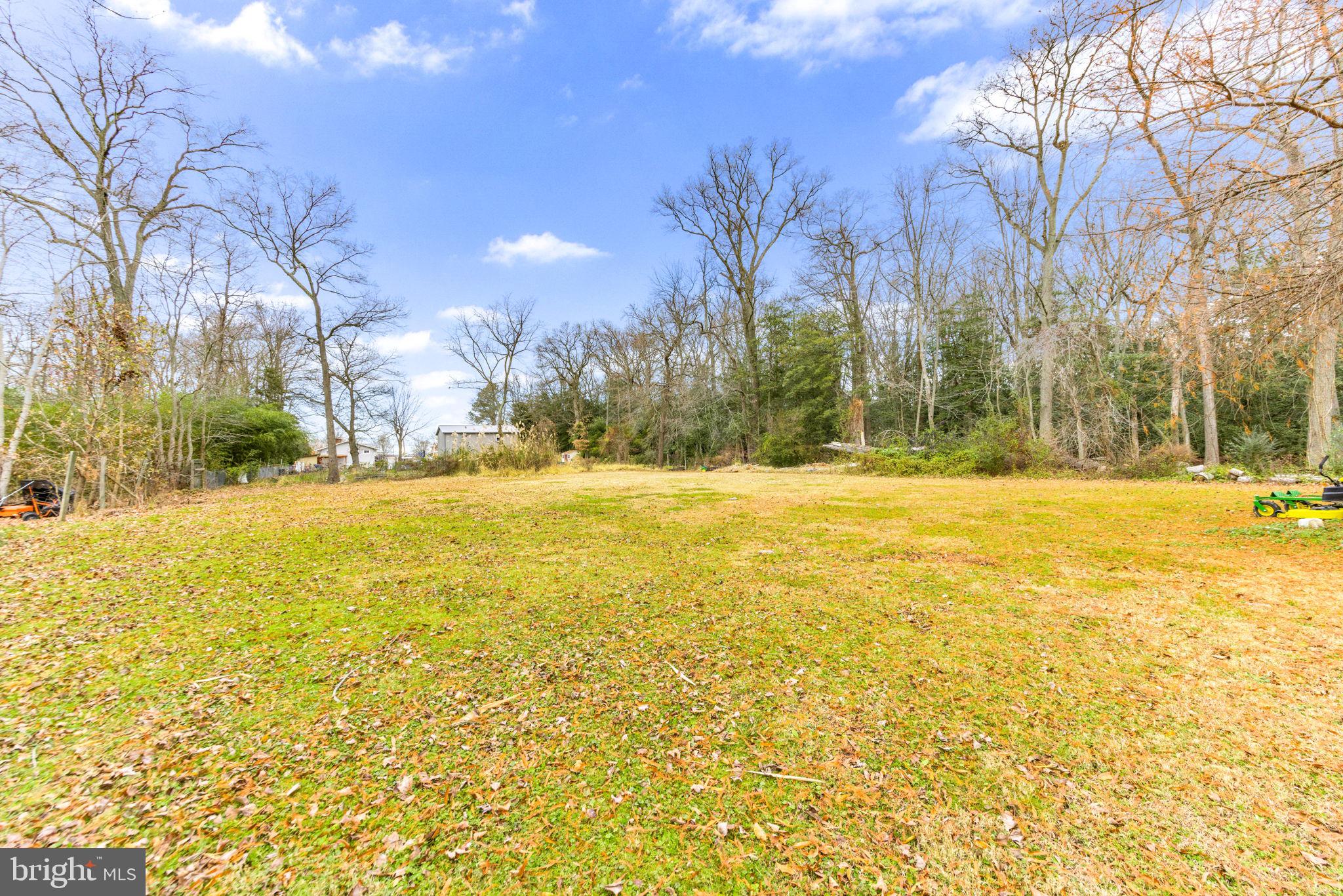 3628 Bay Drive Baltimore, MD 21220 - Photo 67 of 72 a view of the swimming pool with an outdoor space and seating area