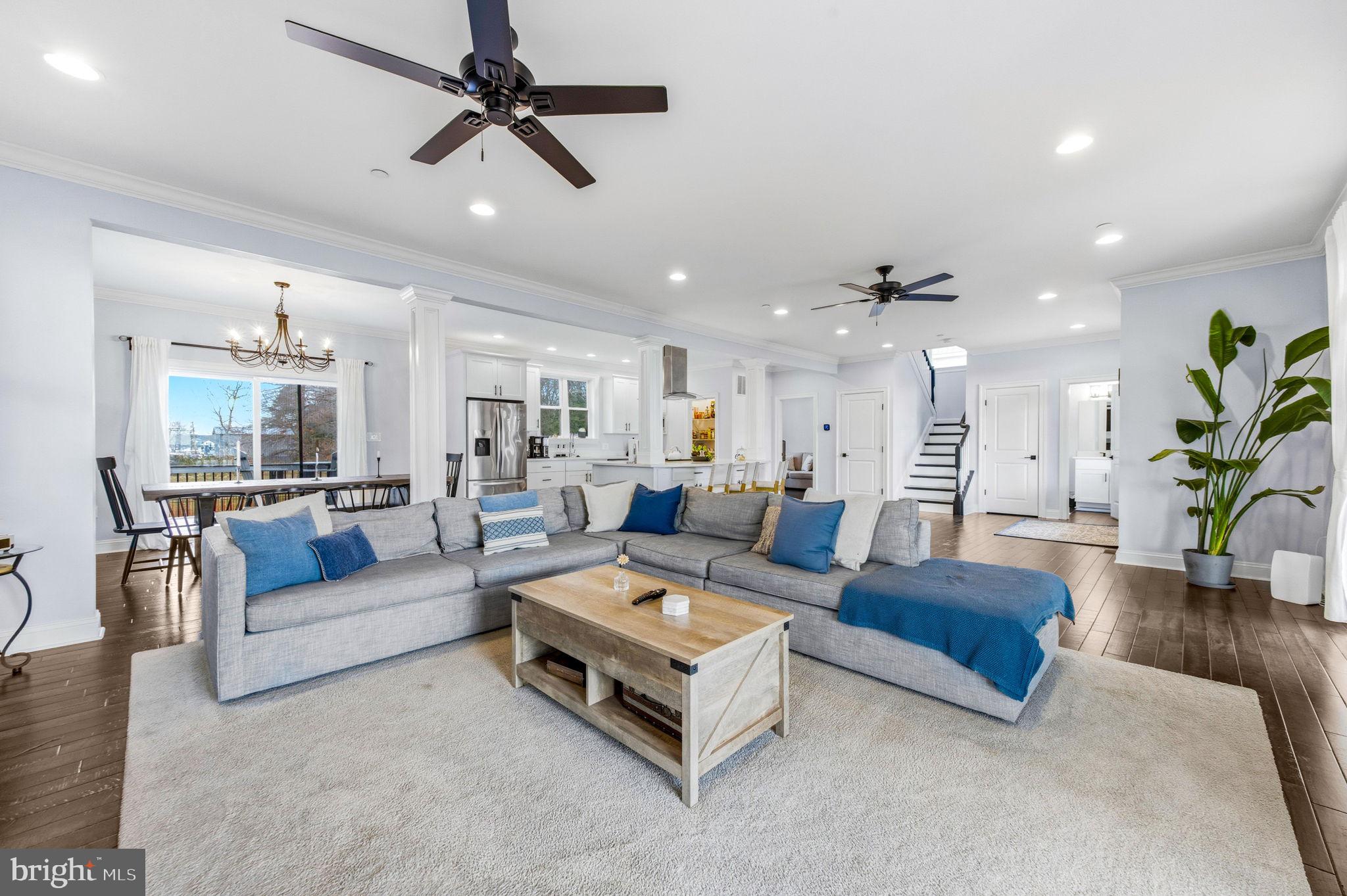 3628 Bay Drive Baltimore, MD 21220 - Photo 9 of 72 a living room with furniture kitchen view and a chandelier
