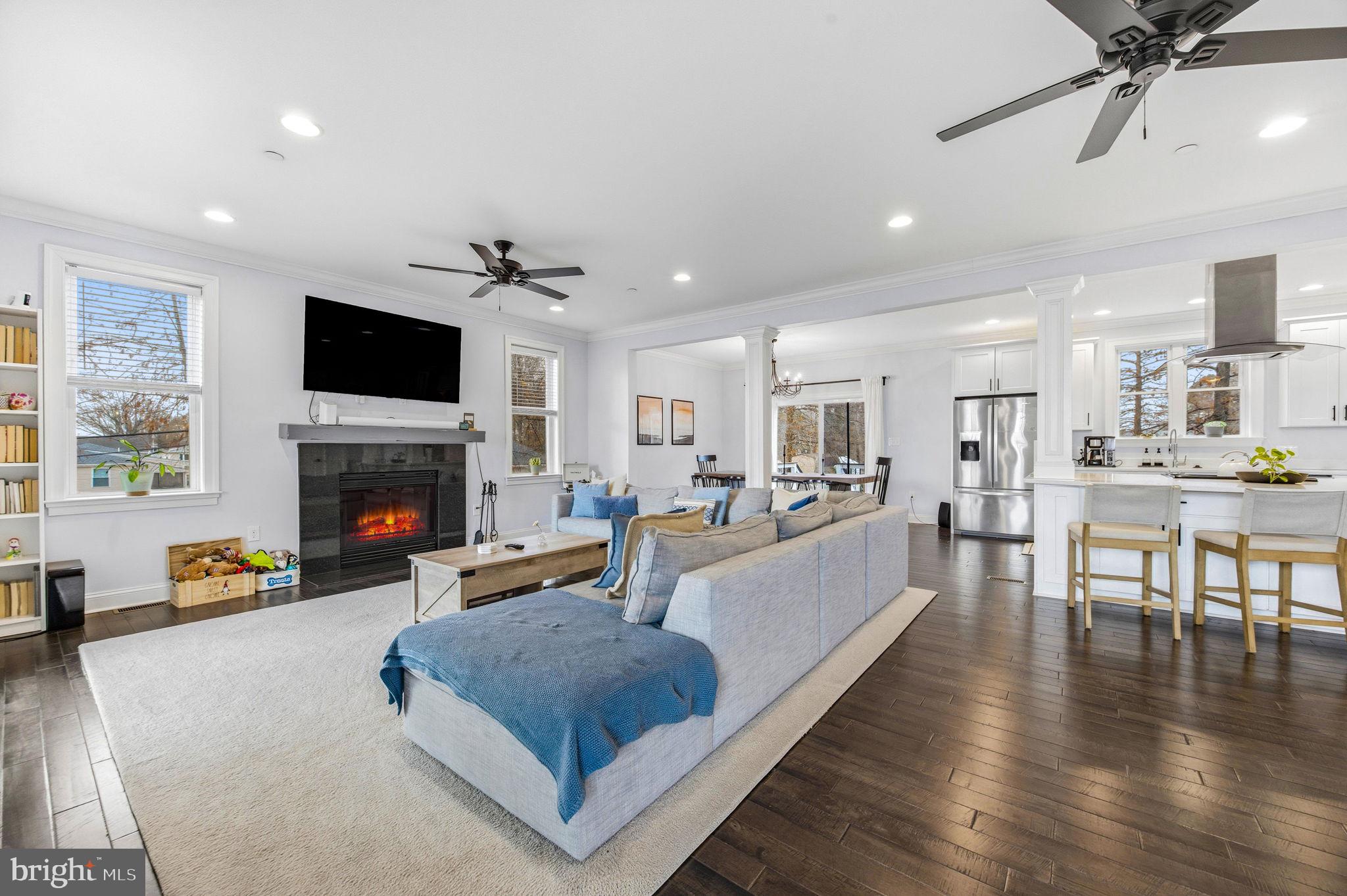3628 Bay Drive Baltimore, MD 21220 - Photo 10 of 72 a living room with furniture fireplace and flat screen tv