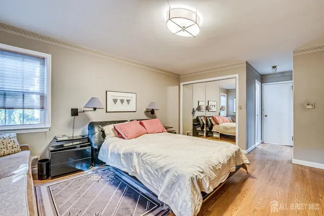 a bedroom with a bed and furniture