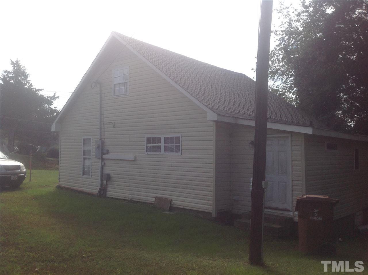 835 South Main Street Roxboro, NC 27573 - Photo 2 of 3 a backyard of a house