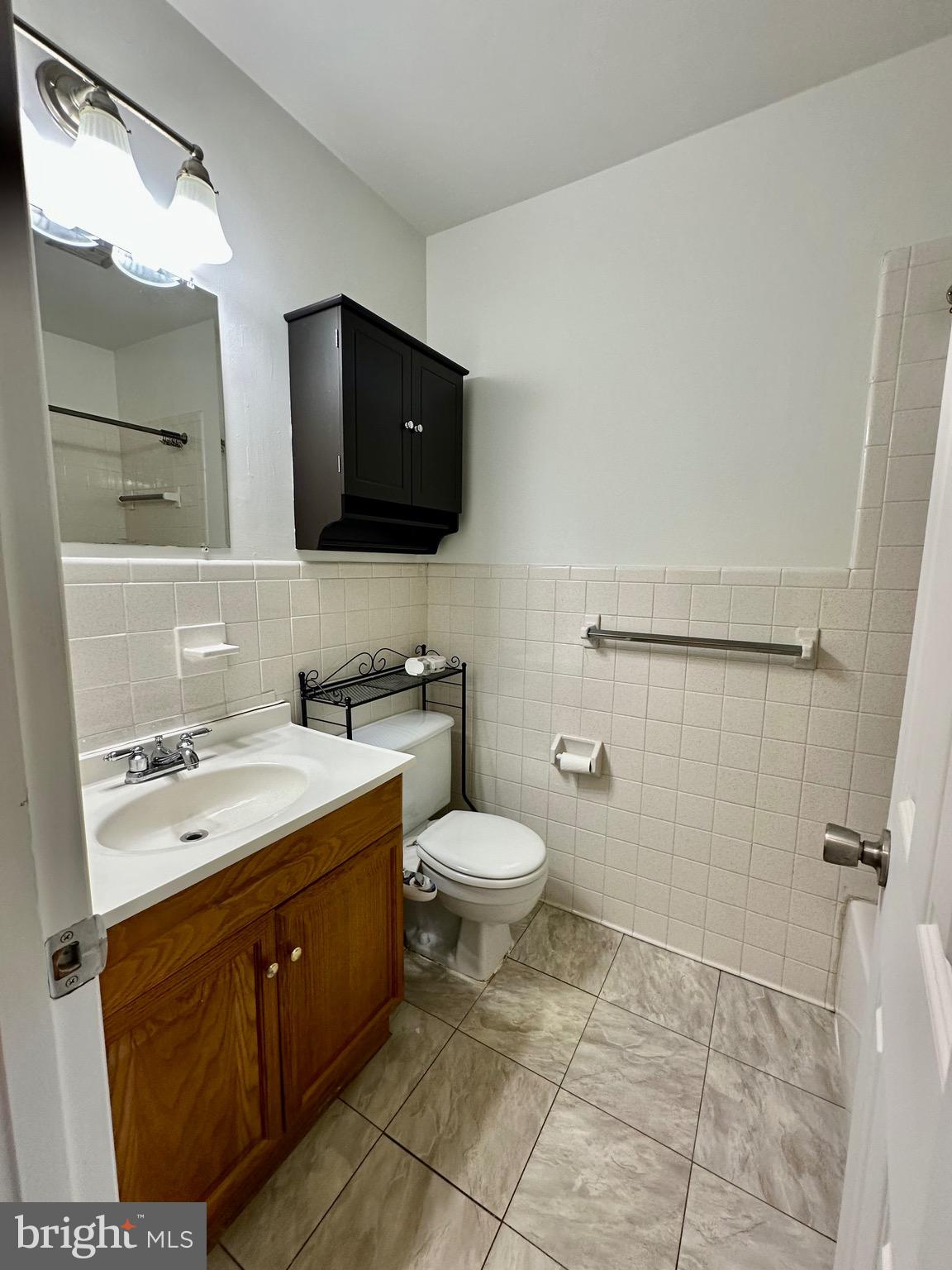 302 Hills Drive Gettysburg, PA 17325 - Photo 13 of 17 a bathroom with a granite countertop sink toilet and shower