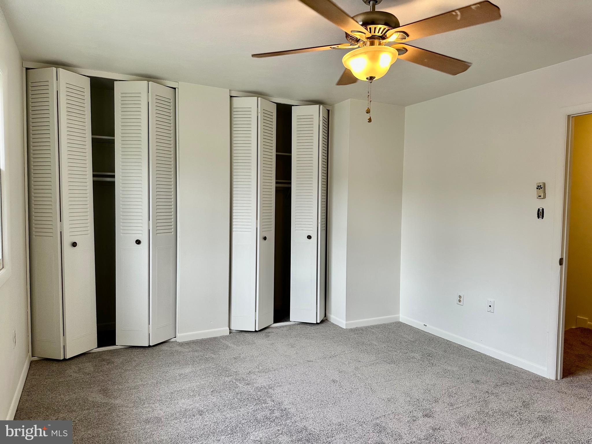 302 Hills Drive Gettysburg, PA 17325 - Photo 15 of 17 an empty room with closet and fan
