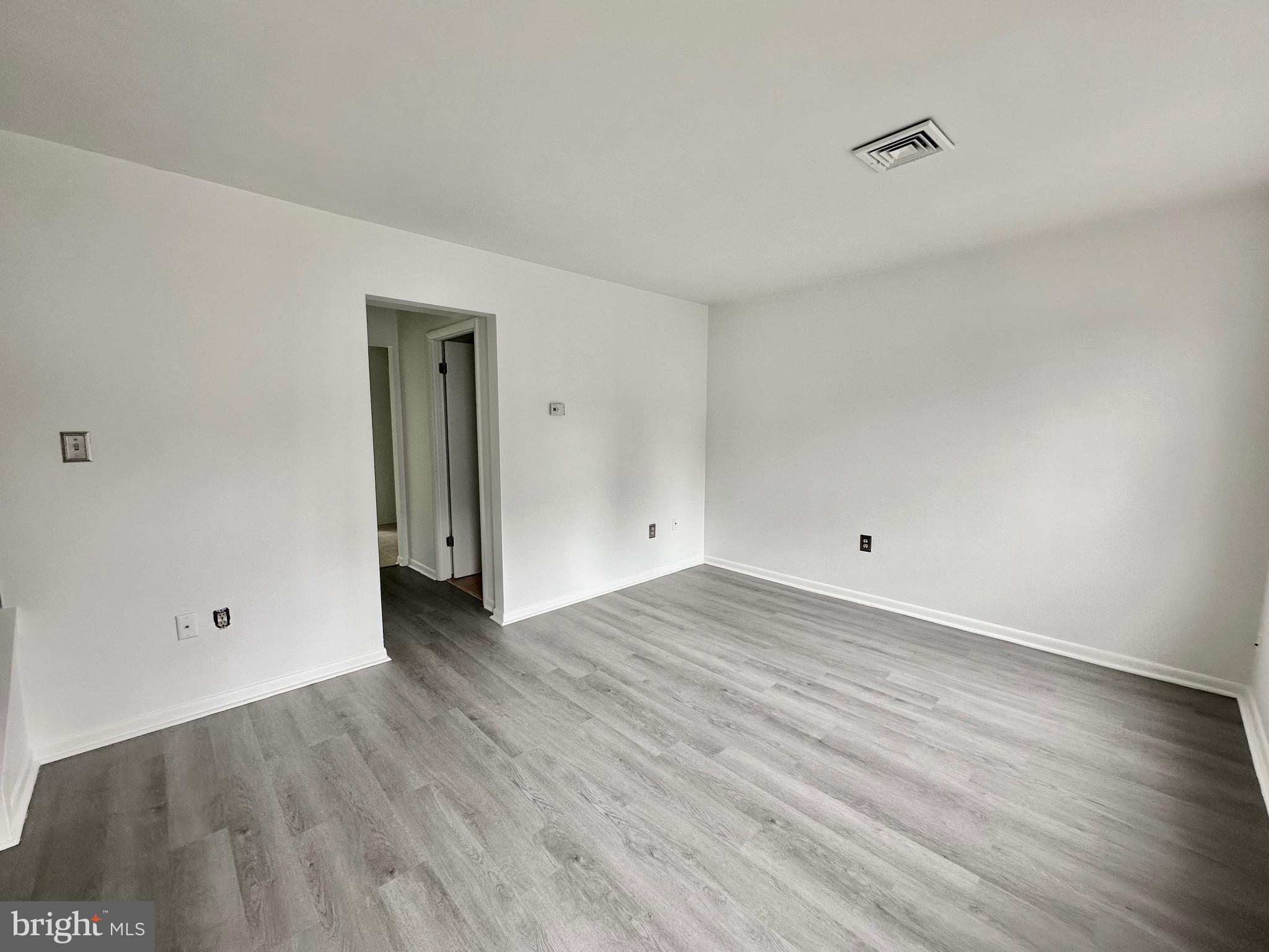 302 Hills Drive Gettysburg, PA 17325 - Photo 2 of 17 a view of a room with wooden floor