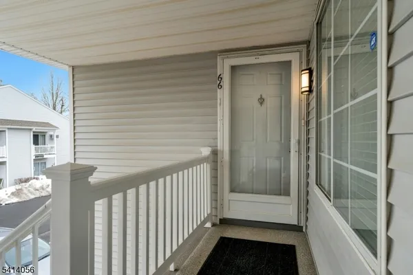a view of a porch of a house