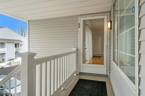 a view of a porch of a house