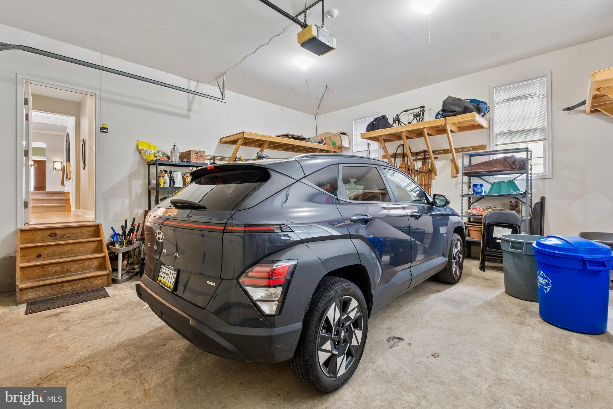 305 Langford Road Broomall, PA 19008 - Photo 72 of 83 a car and bike parked in a garage