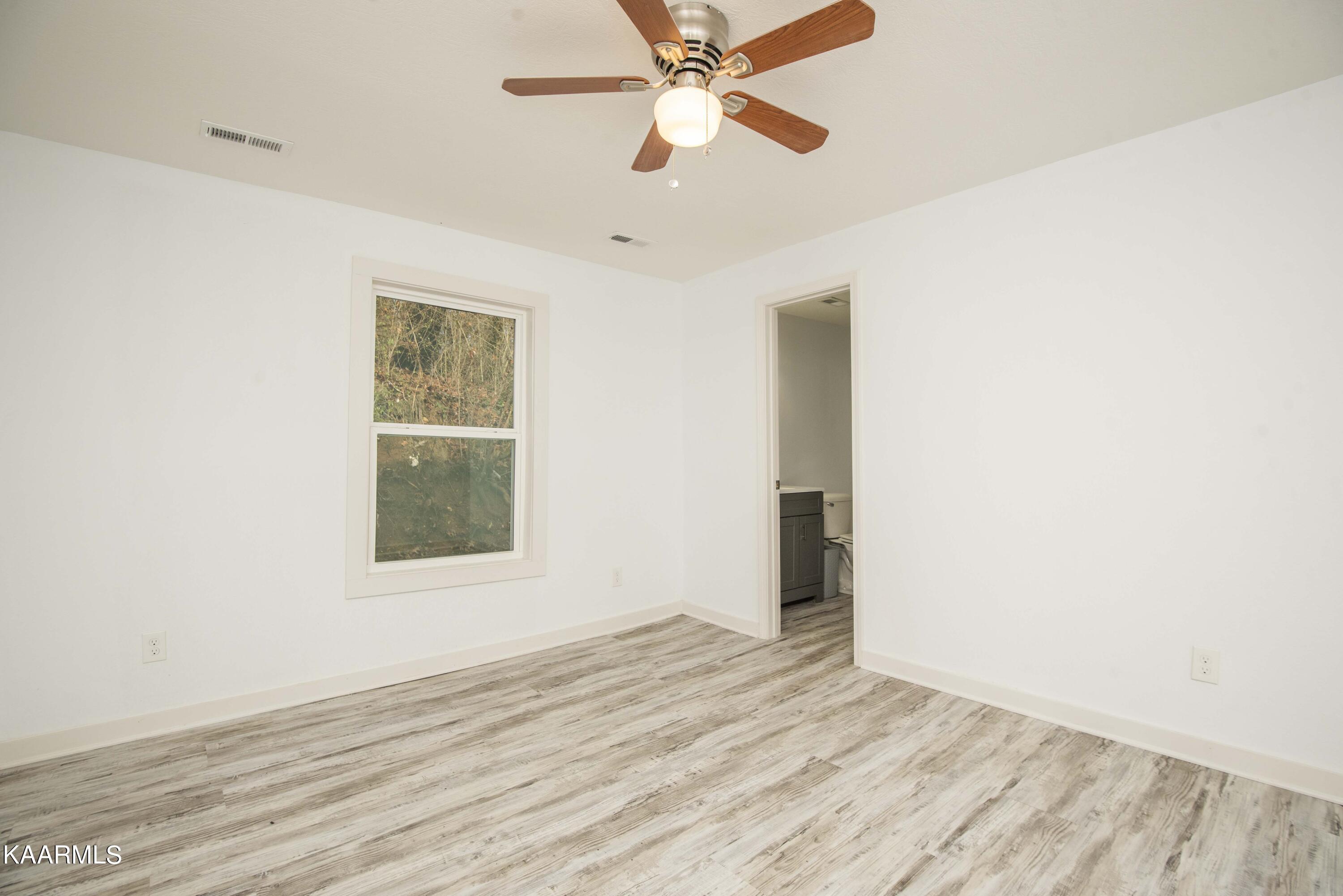 221 Offutt Road Clinton, TN 37716 - Photo 16 of 41 master bed 1_1