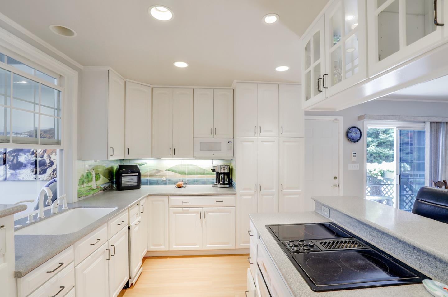 7840 Stage Road San Gregorio, CA 94074 - Photo 11 of 42 a kitchen with a sink stove and cabinets