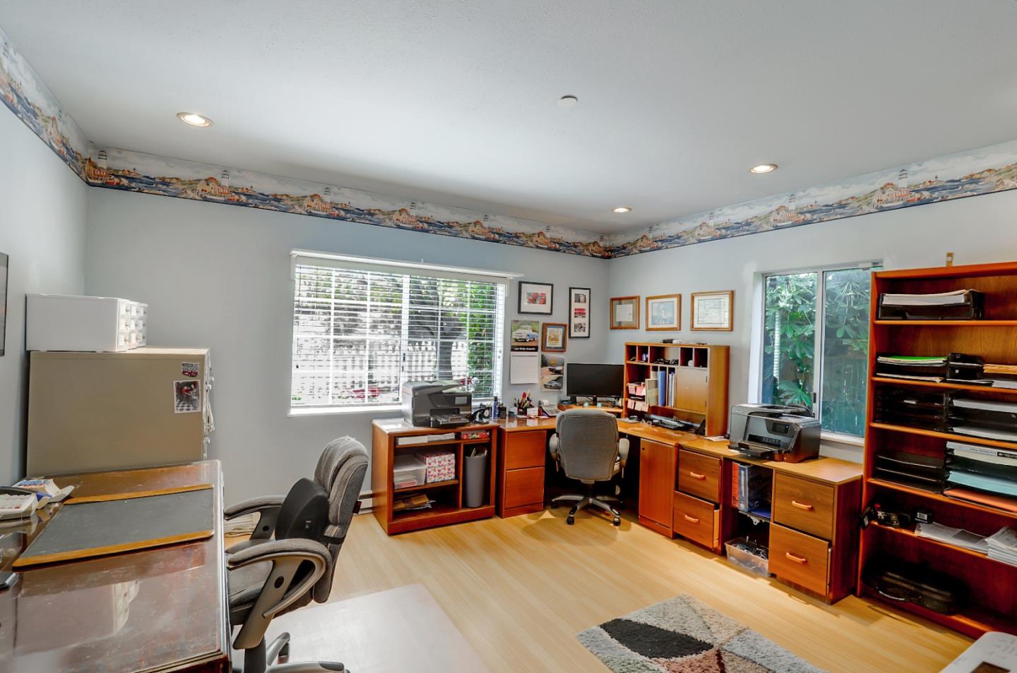 7840 Stage Road San Gregorio, CA 94074 - Photo 14 of 42 a view of a workspace with furniture and a window