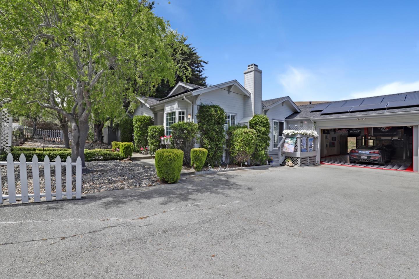 7840 Stage Road San Gregorio, CA 94074 - Photo 3 of 42 a view of a house with a cars park next to a road