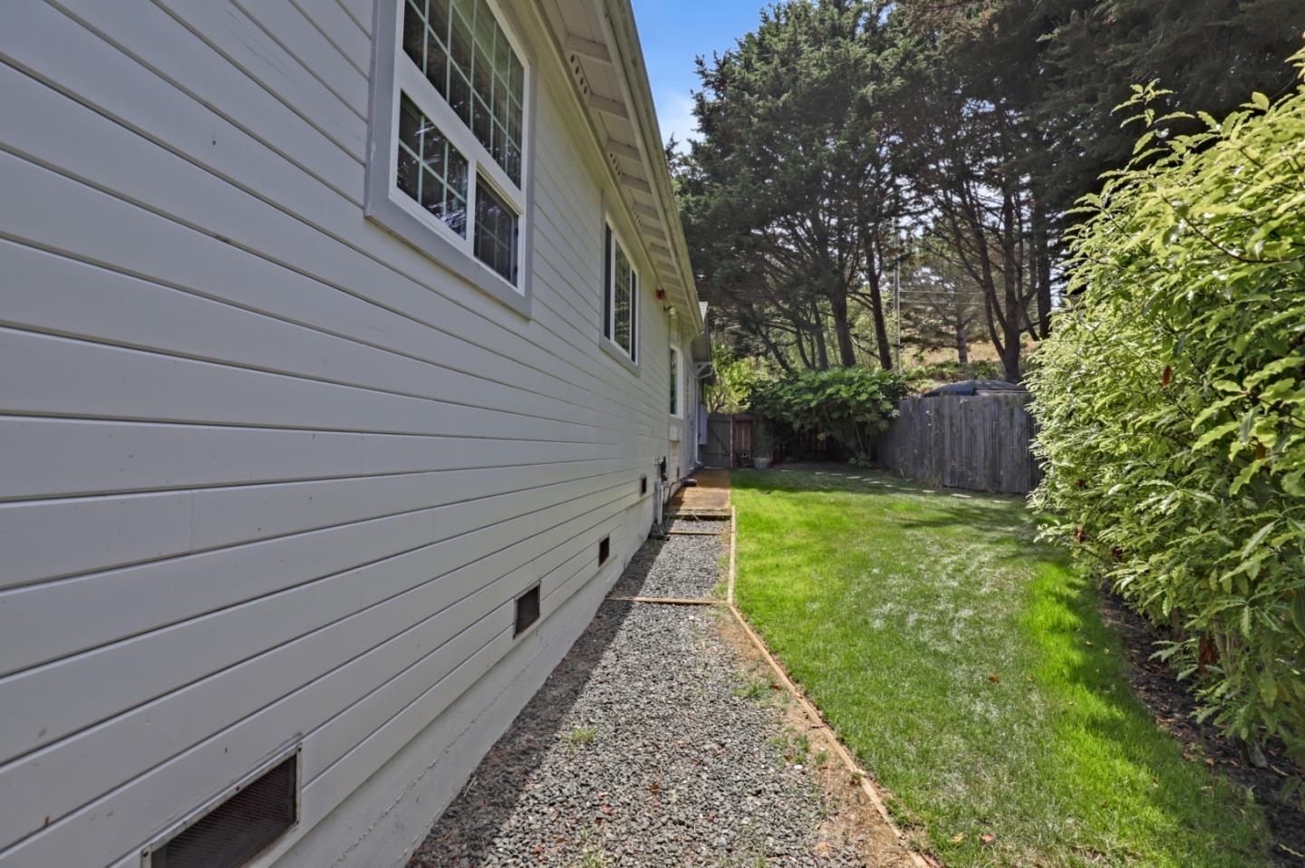 7840 Stage Road San Gregorio, CA 94074 - Photo 27 of 42 a backyard of a house with lots of green space