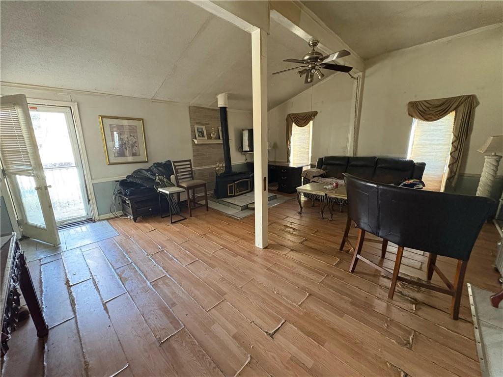 4750 Ridgewood Road Monroe, GA 30656 - Photo 11 of 23 a view of a livingroom with furniture window and wooden floor