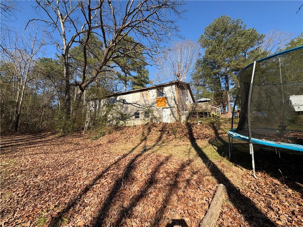 4750 Ridgewood Road Monroe, GA 30656 - Photo 20 of 23 a view of a backyard