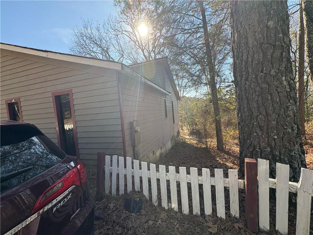 4750 Ridgewood Road Monroe, GA 30656 - Photo 22 of 23 a view of a house with a yard