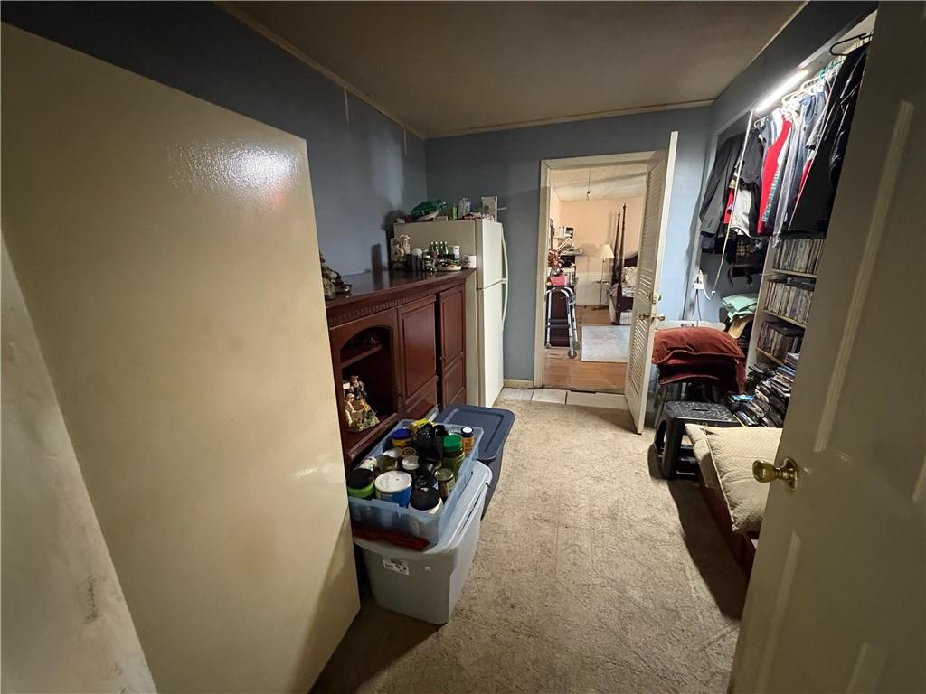 4750 Ridgewood Road Monroe, GA 30656 - Photo 6 of 23 a living room with furniture and a flat screen tv