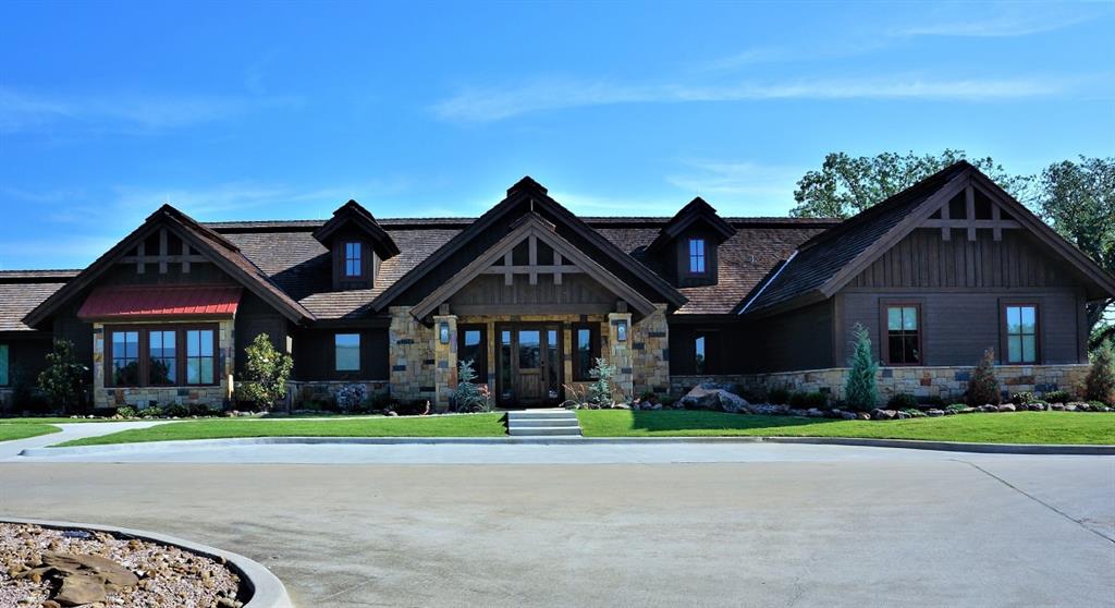 Lot 12 Windrose Loop Gordonville, TX 76245 - Photo 12 of 32 a front view of house with yard and green space