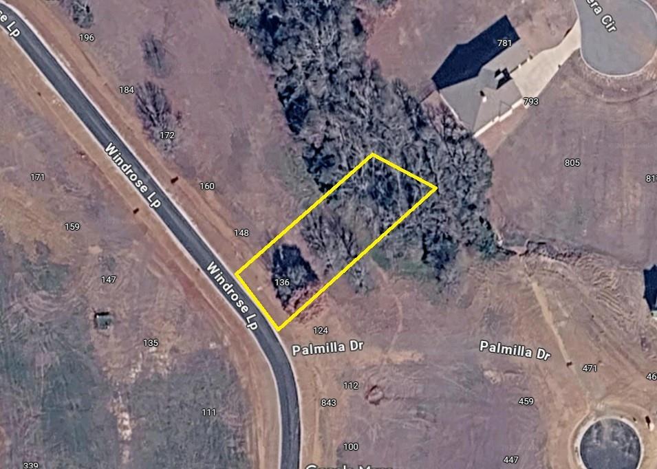 Lot 12 Windrose Loop Gordonville, TX 76245 - Photo 2 of 32 an aerial view of a backyard