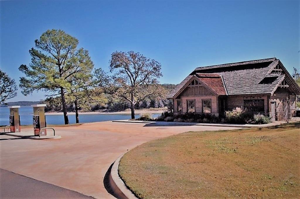 Lot 12 Windrose Loop Gordonville, TX 76245 - Photo 27 of 32 a view of a house with snow on the road