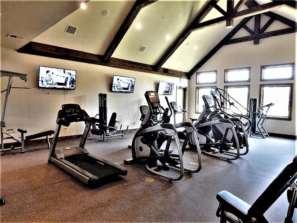 Lot 12 Windrose Loop Gordonville, TX 76245 - Photo 30 of 32 a view of a room with gym equipment