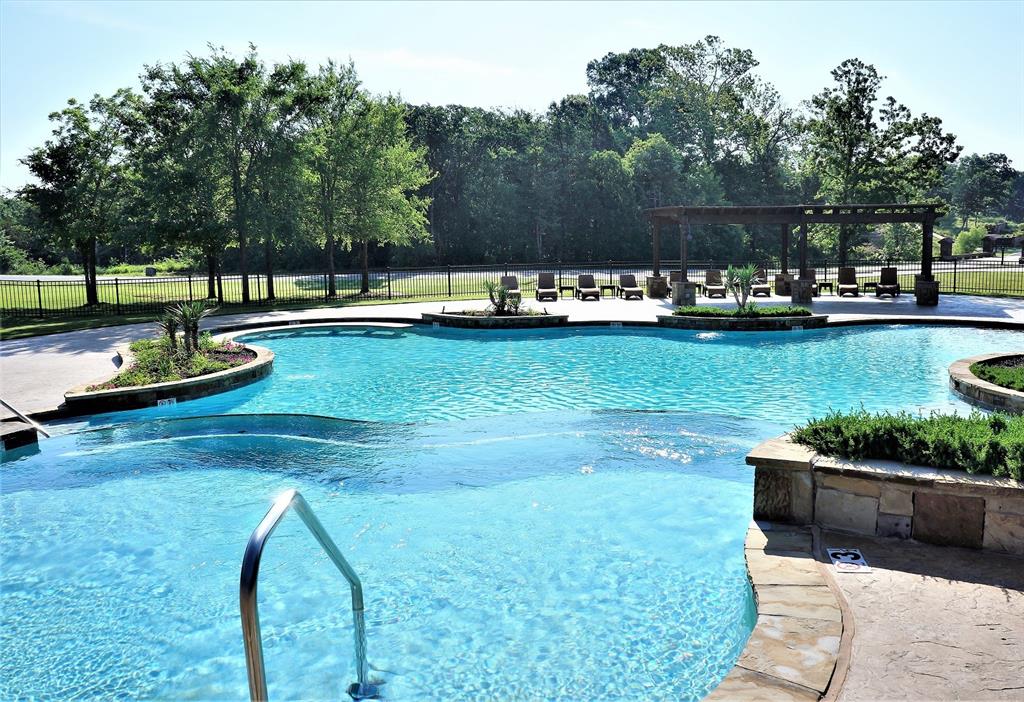 Lot 12 Windrose Loop Gordonville, TX 76245 - Photo 10 of 32 a view of a swimming pool with a patio and plants