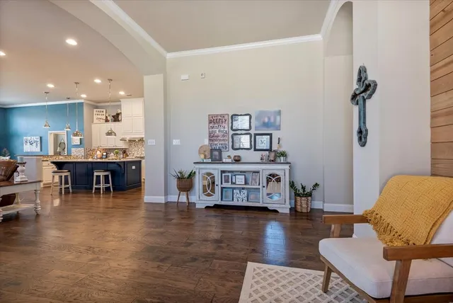 a living room with furniture and a table