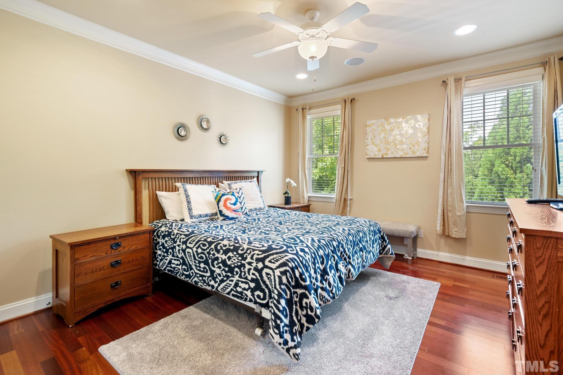 3005 London Bell Drive Raleigh, NC 27614 - Photo 13 of 73 a bedroom with a large bed and a window