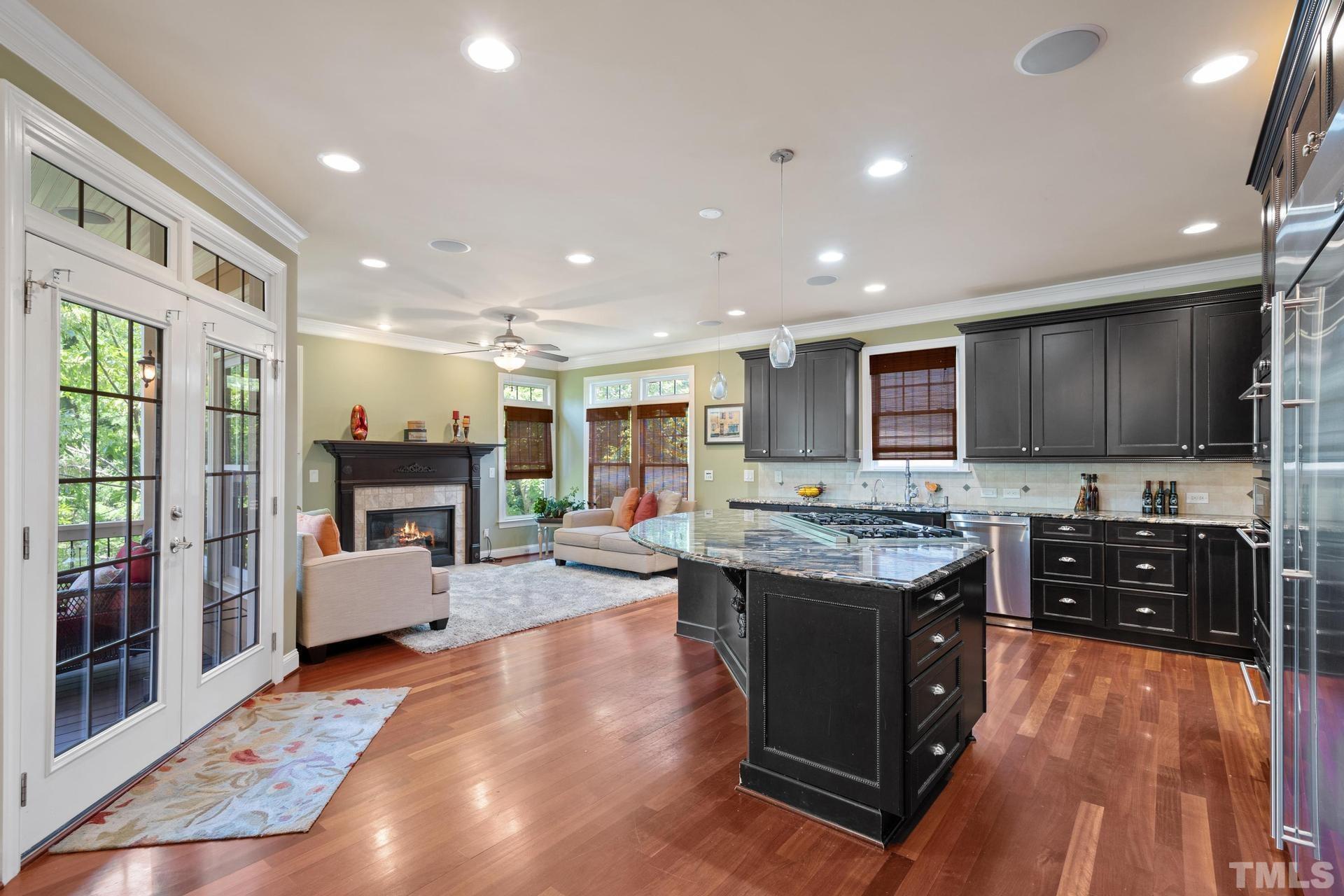 3005 London Bell Drive Raleigh, NC 27614 - Photo 31 of 73 a kitchen with a stove and a refrigerator