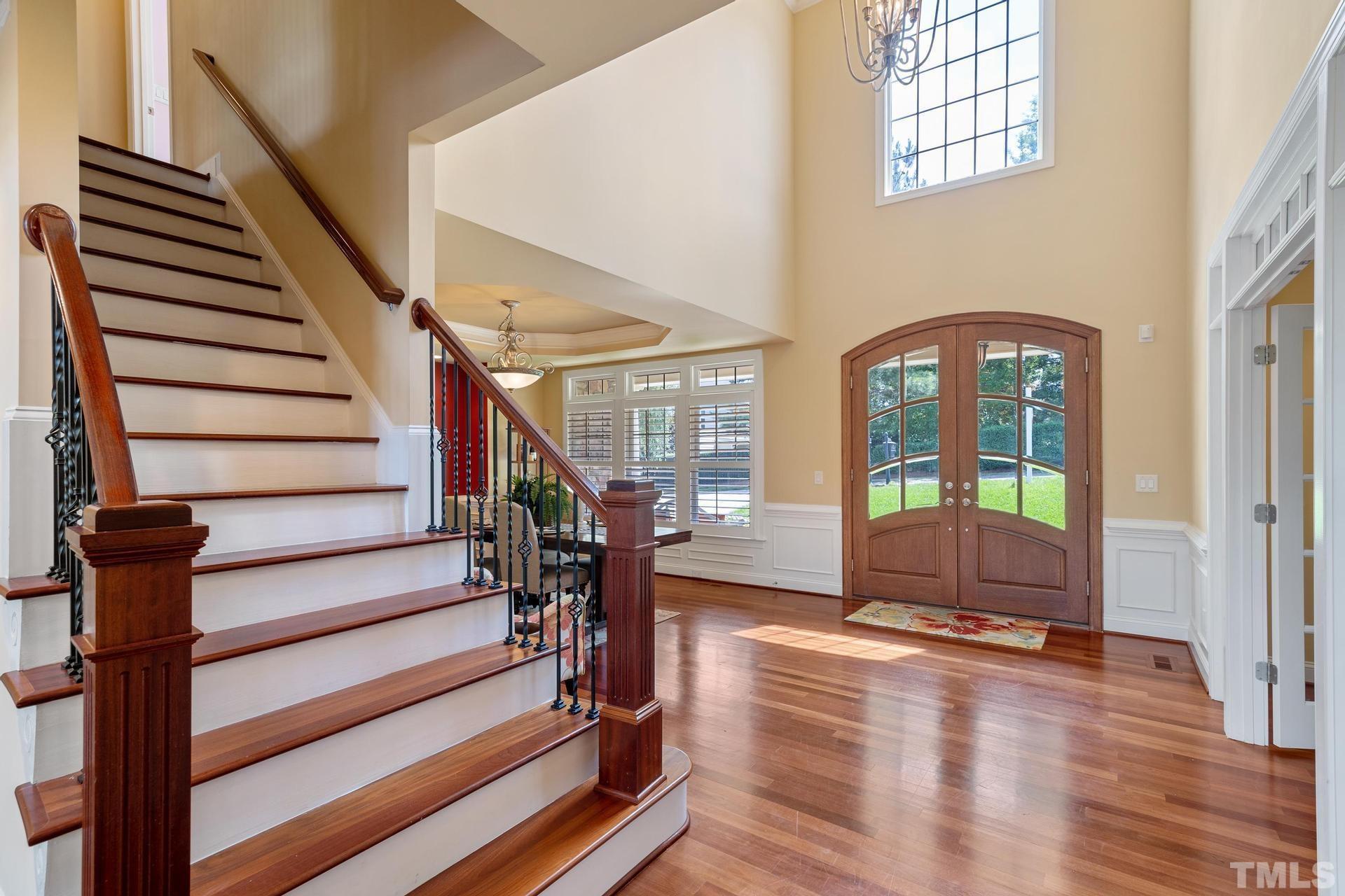 3005 London Bell Drive Raleigh, NC 27614 - Photo 34 of 73 a view of entryway with wooden floor and a front door