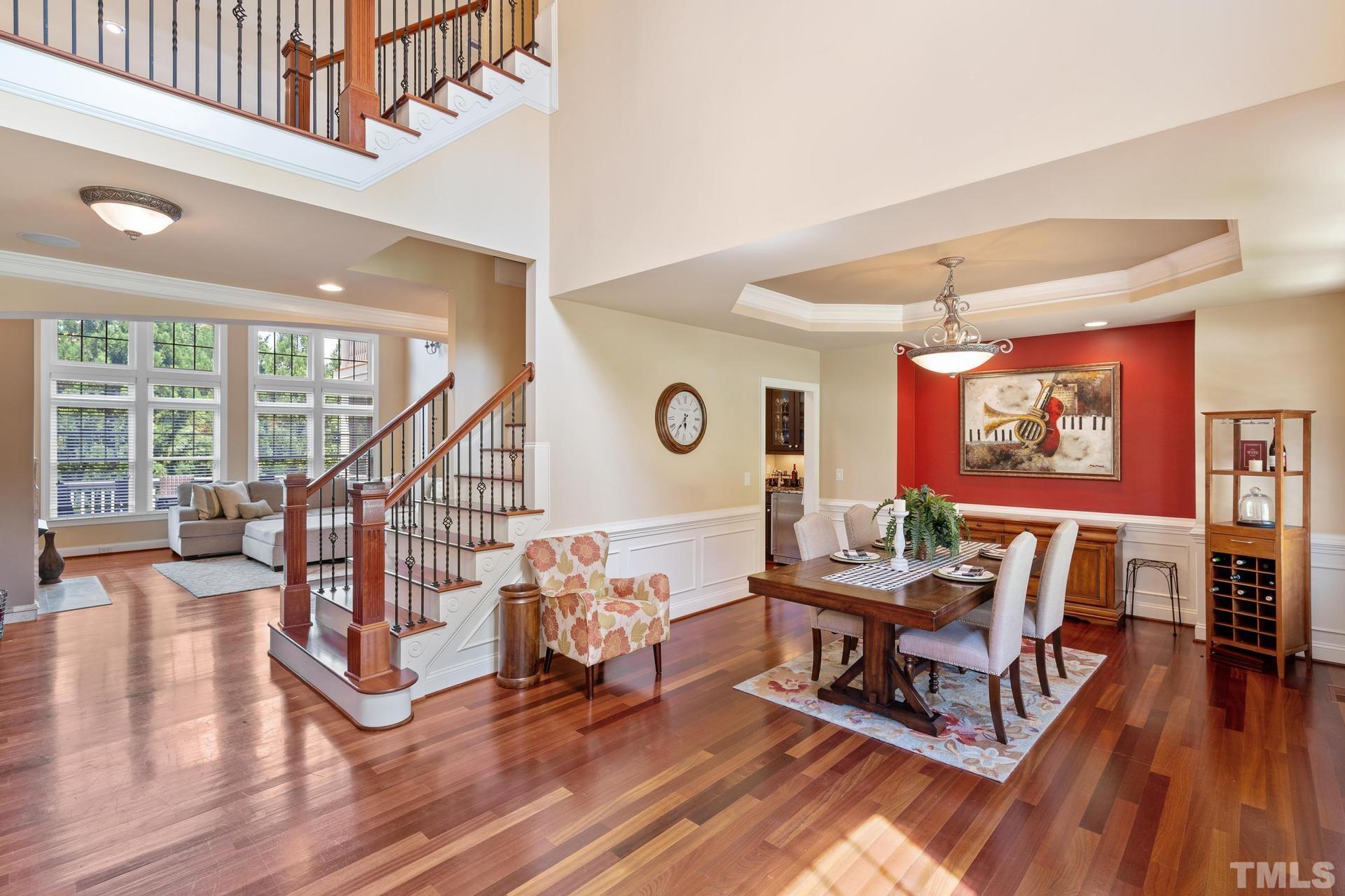 3005 London Bell Drive Raleigh, NC 27614 - Photo 36 of 73 a living room with furniture and a wooden floor