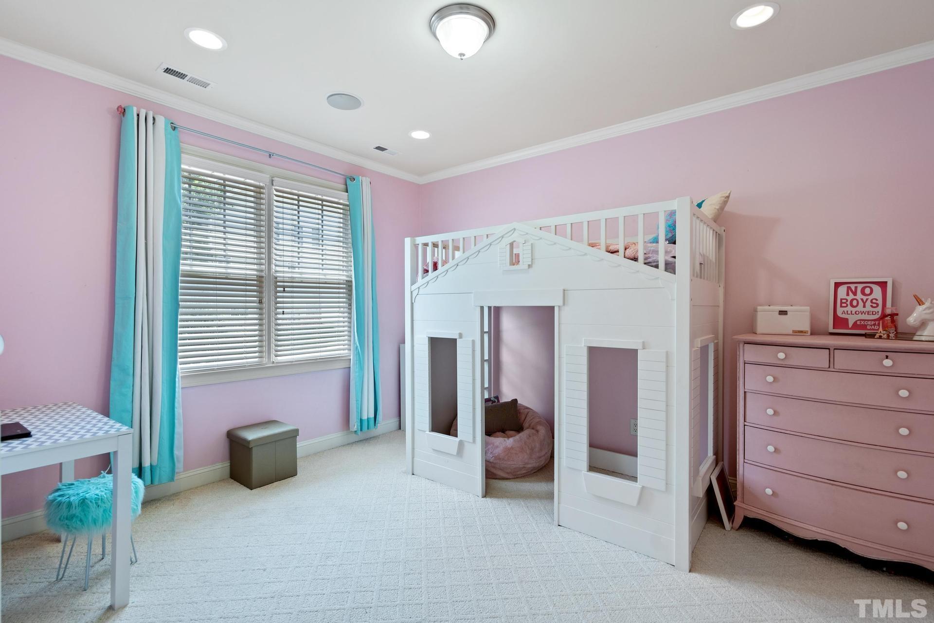 3005 London Bell Drive Raleigh, NC 27614 - Photo 46 of 73 a spacious bedroom with a bed and a cabinets
