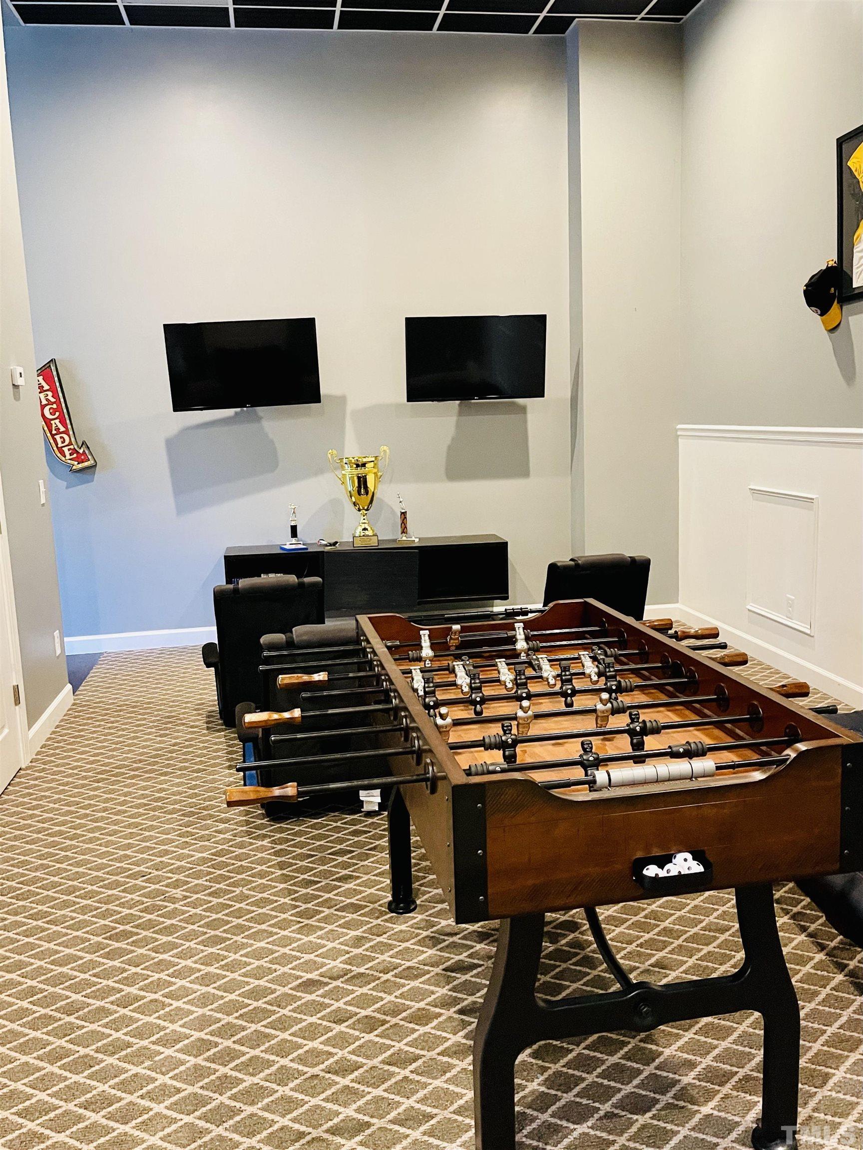 3005 London Bell Drive Raleigh, NC 27614 - Photo 6 of 73 a living room with a flat screen tv and a fireplace