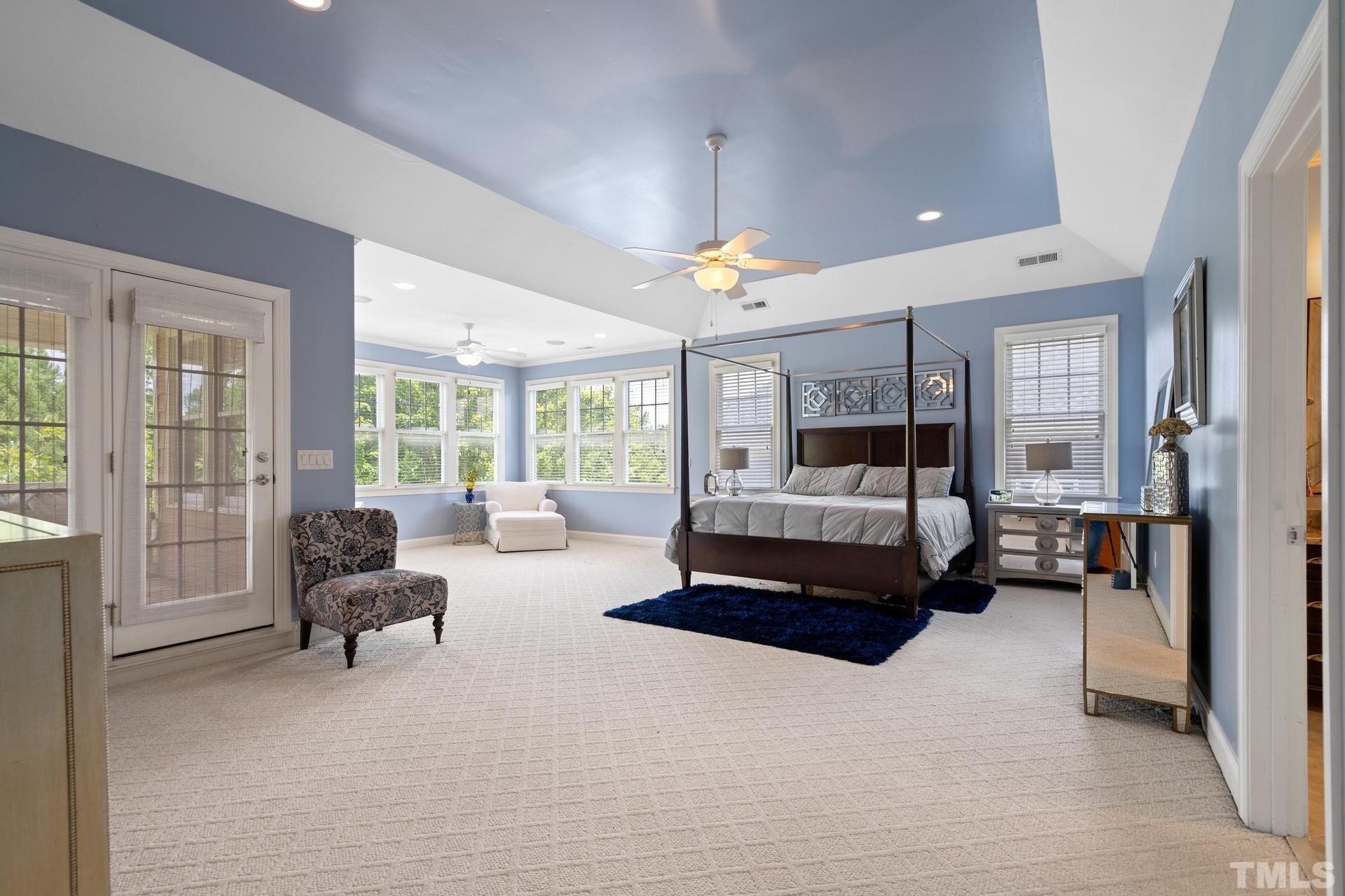 3005 London Bell Drive Raleigh, NC 27614 - Photo 63 of 73 a bedroom with furniture and large windows